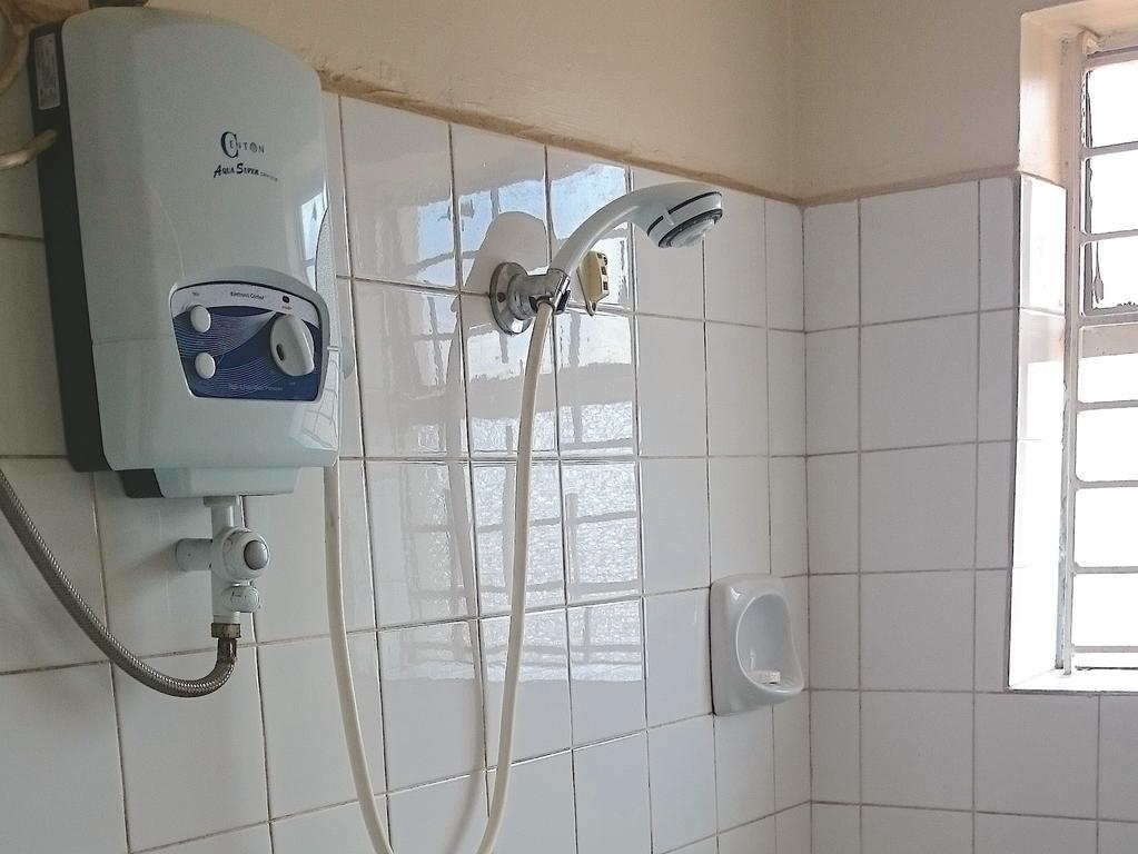 Hotel Acacia City Kampala Szoba fotó